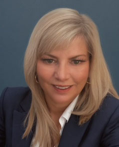 lady smiling business formal blonde hair